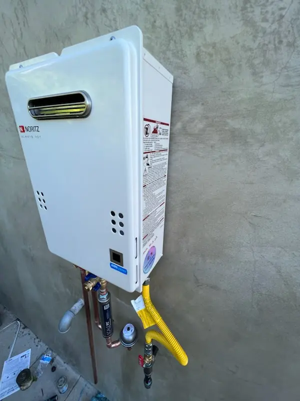 Tankless water heater installation for Brass Castle homes